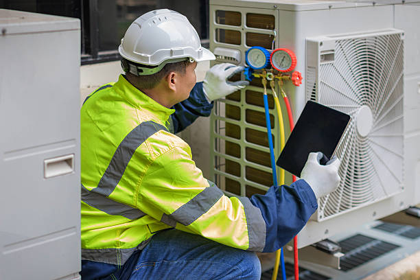 Professional Air Duct Cleaning technician working in Yukon, PA